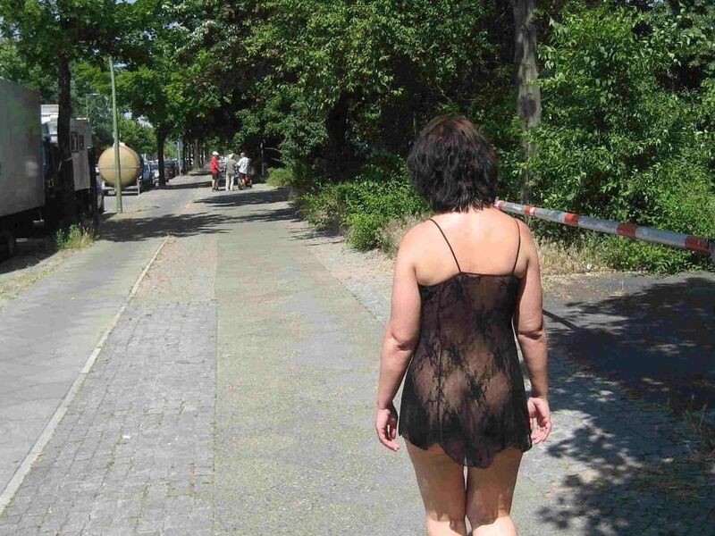 Slutty German wife exposing in public - but who is she? 13 of 68 pics