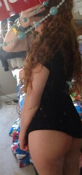 Beautiful hippy teen with curly red hair 4 of 41 pics
