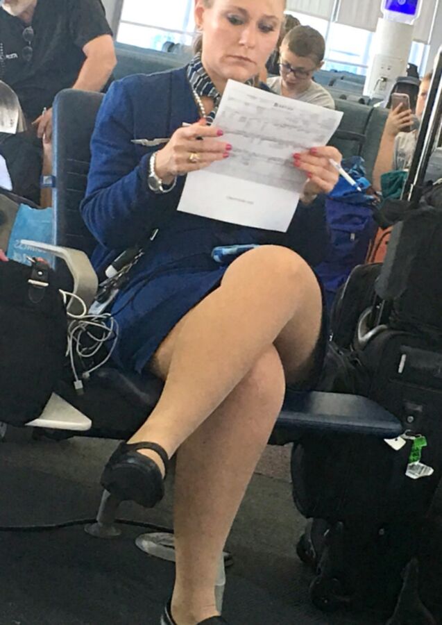 Crossed Legs posed on Planes and in Airports 6 of 424 pics