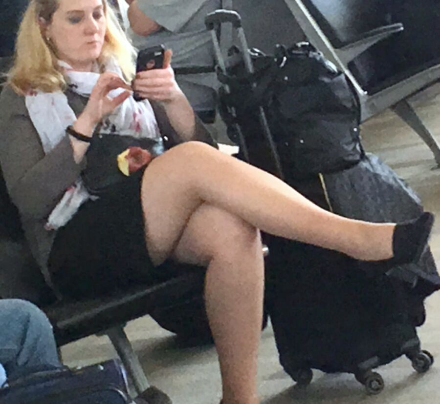 Crossed Legs posed on Planes and in Airports 20 of 424 pics
