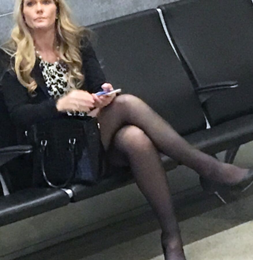 Crossed Legs posed on Planes and in Airports 17 of 424 pics