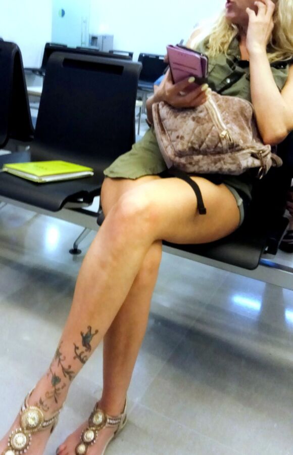 Crossed Legs posed on Planes and in Airports 16 of 424 pics