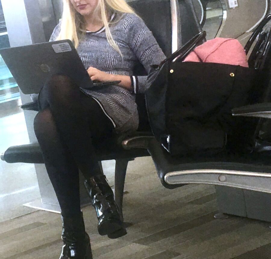Crossed Legs posed on Planes and in Airports 11 of 424 pics