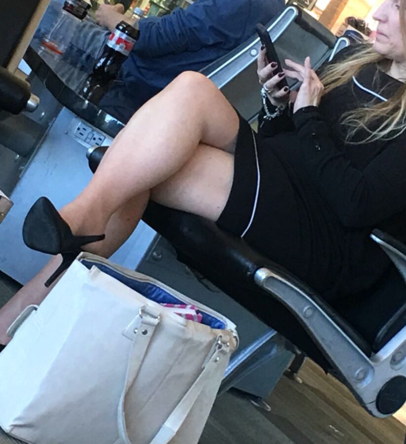 Crossed Legs posed on Planes and in Airports 3 of 424 pics