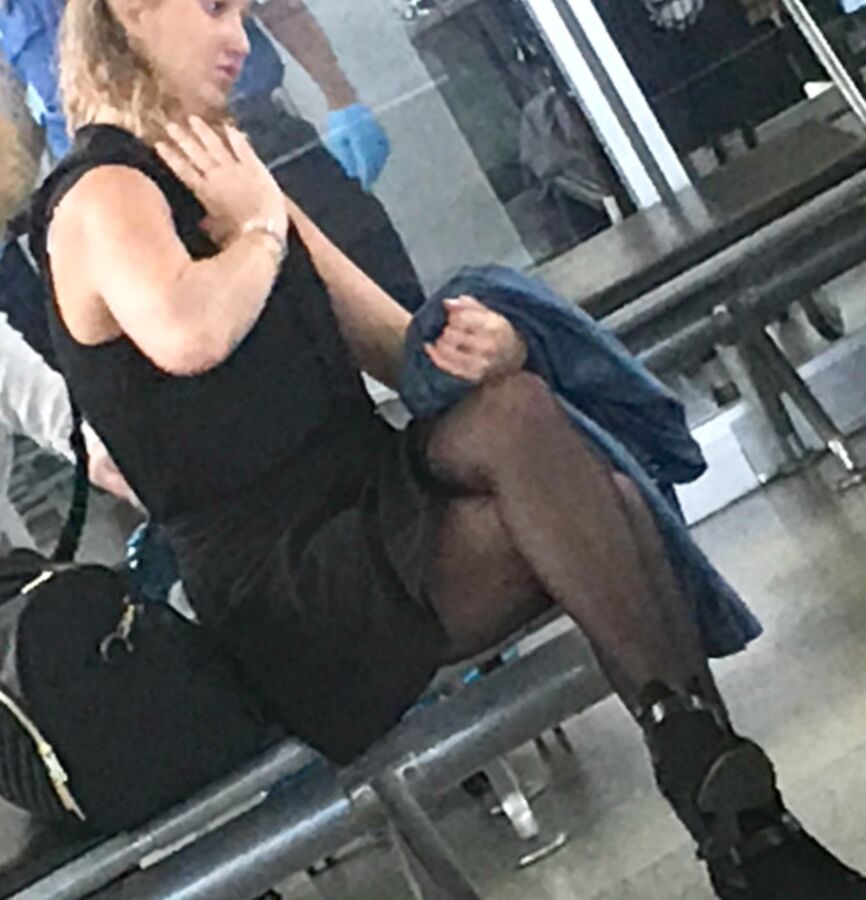 Crossed Legs posed on Planes and in Airports 8 of 424 pics