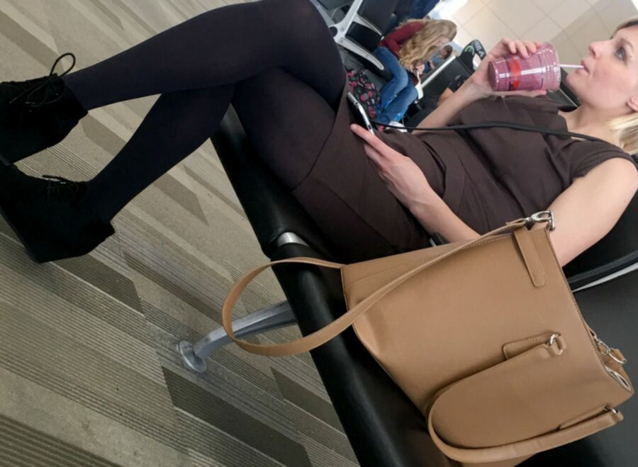 Crossed Legs posed on Planes and in Airports 10 of 424 pics