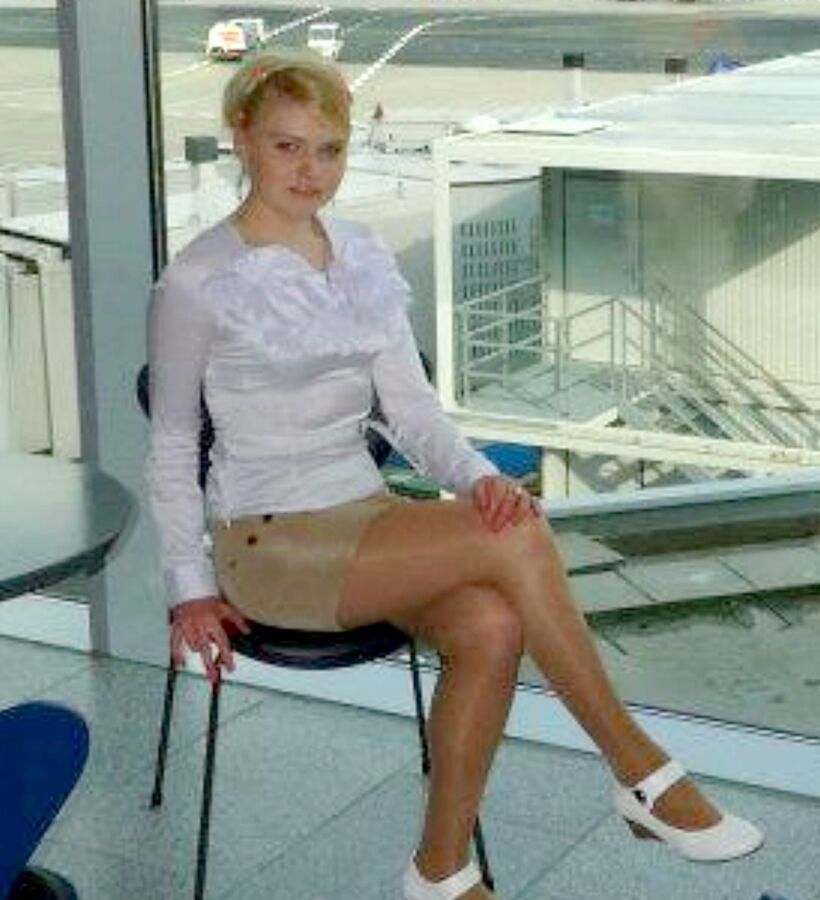 Crossed Legs posed on Planes and in Airports 13 of 424 pics