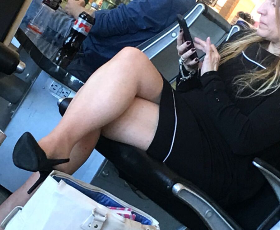 Crossed Legs posed on Planes and in Airports 5 of 424 pics