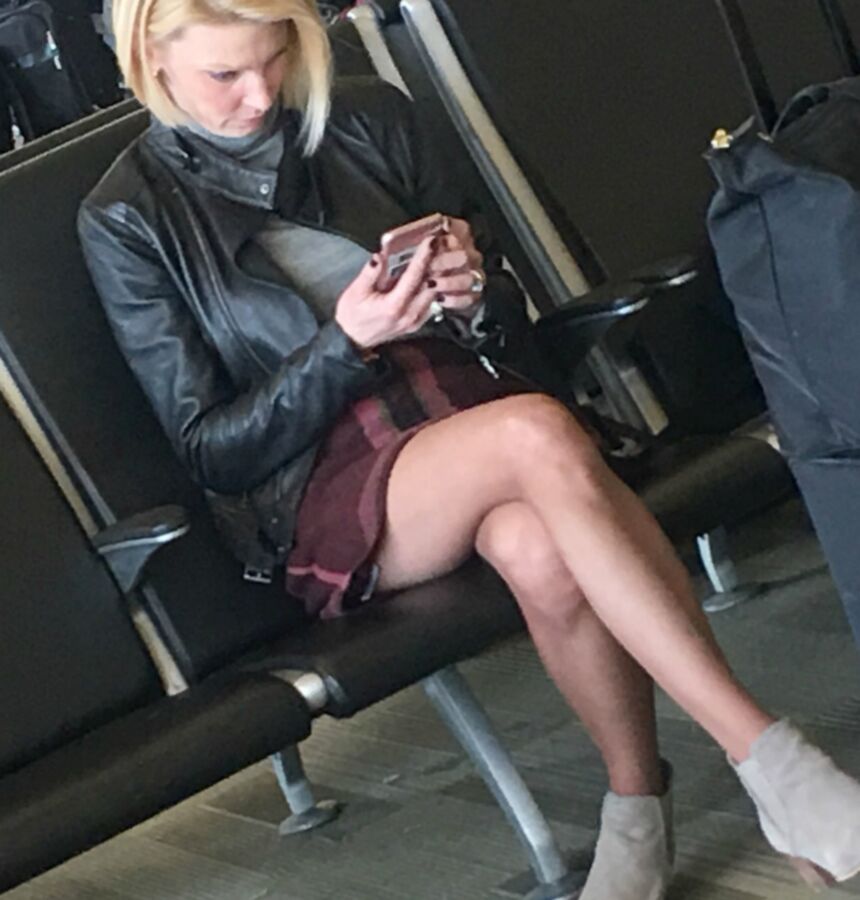 Crossed Legs posed on Planes and in Airports 24 of 424 pics