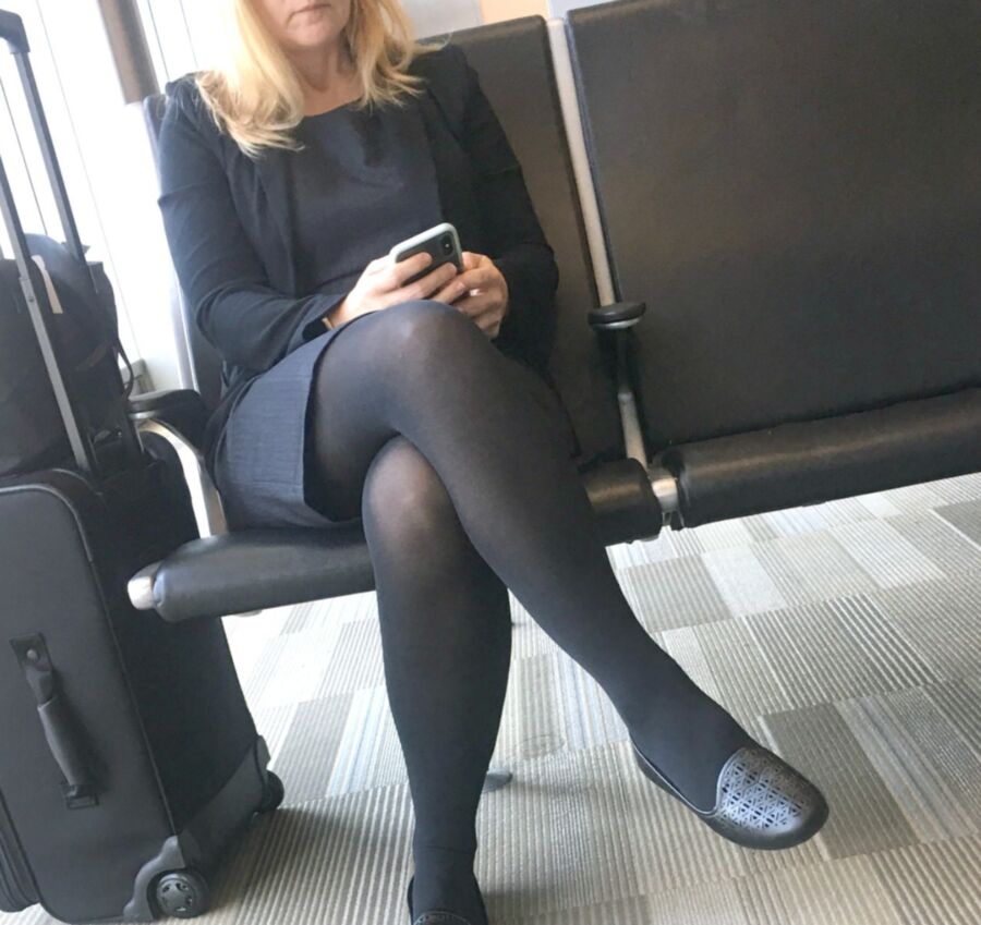 Crossed Legs posed on Planes and in Airports 18 of 424 pics