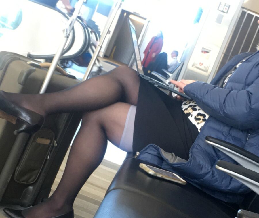 Crossed Legs posed on Planes and in Airports 4 of 424 pics