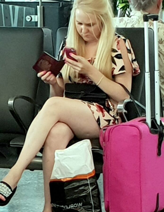 Crossed Legs posed on Planes and in Airports 14 of 424 pics