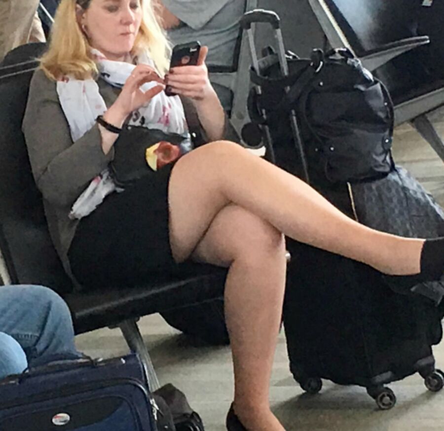 Crossed Legs posed on Planes and in Airports 21 of 424 pics