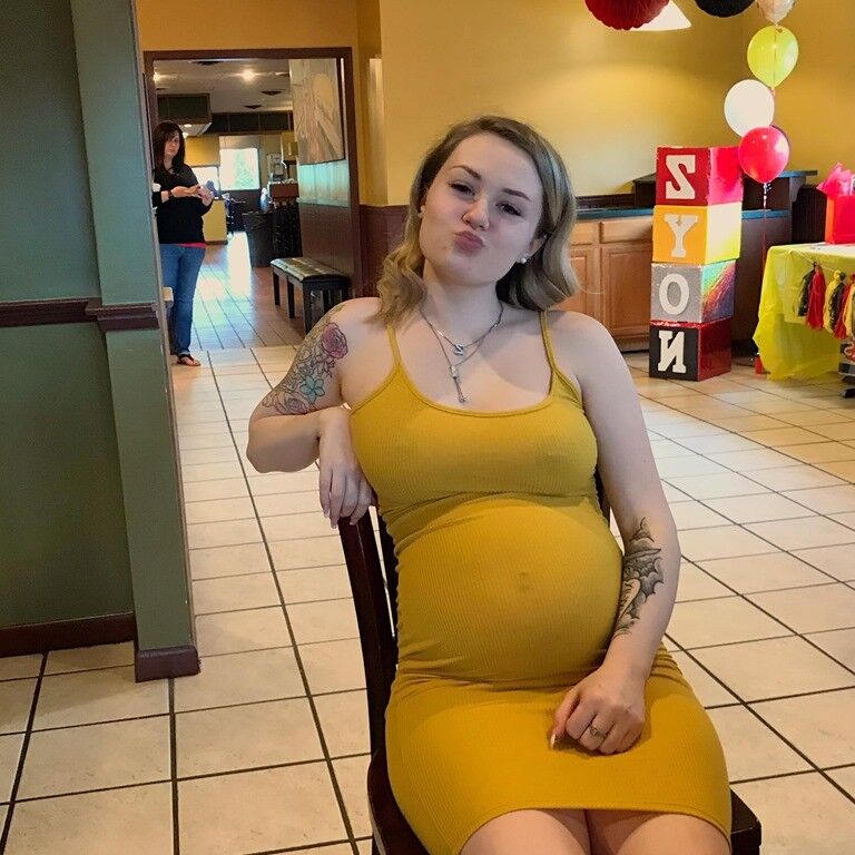 Young Pregnant Woman in Yellow 15 of 28 pics