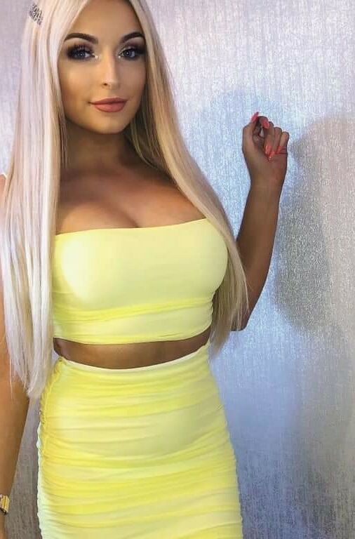 Filthy blonde bimbo loves showing off her fat tits 2 of 23 pics