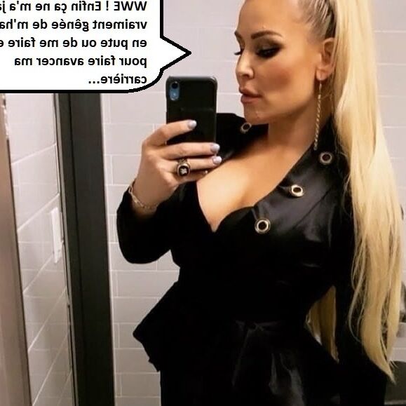 Natalya (WWE) en captions 9 of 17 pics