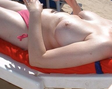 Topless British beach milf 4 of 9 pics