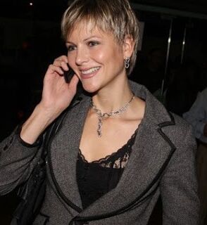Short-haired MILF politician and former model (non-nude) 1 of 11 pics