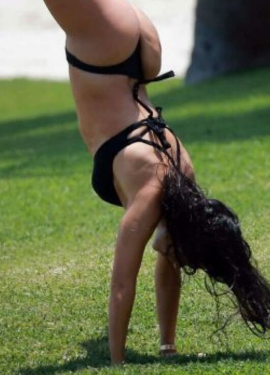 Kourtney Kardashian - Black Bikini And Flexible 8 of 24 pics
