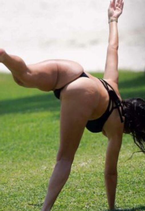 Kourtney Kardashian - Black Bikini And Flexible 7 of 24 pics