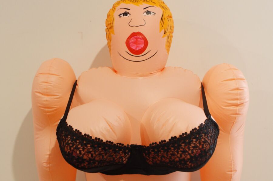 Fatty Patty love doll dressed in a lacy black bra and panties and suspender...
