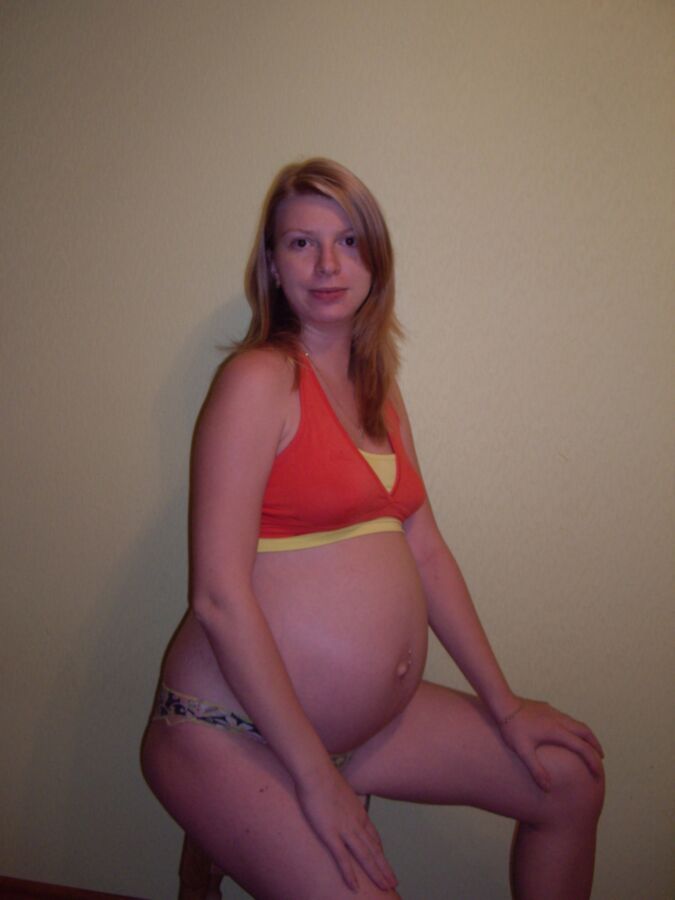 Young Russian pregnant amateur blonde - Nuded Photo.
