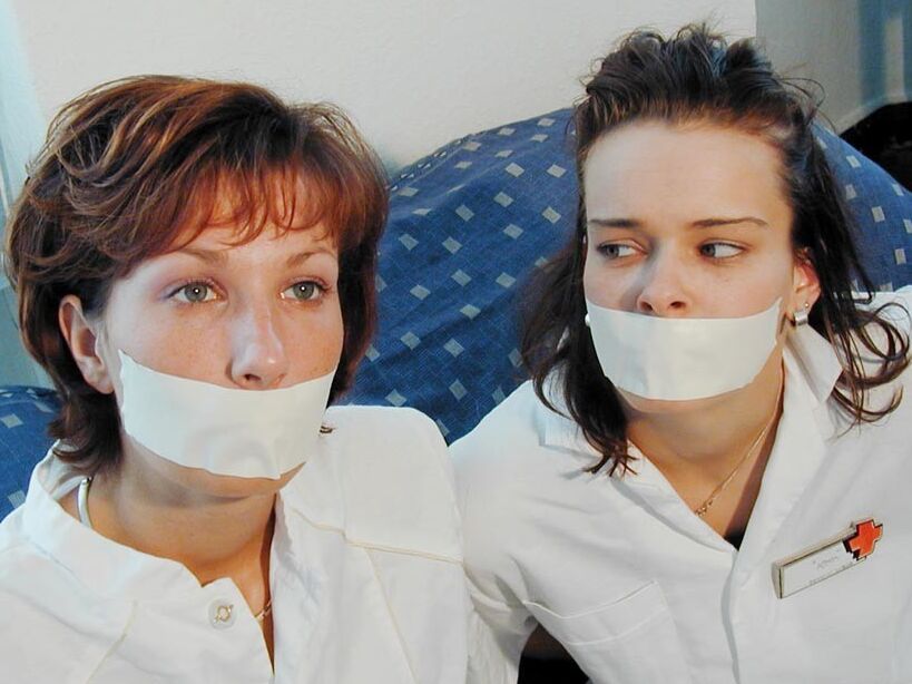 Two cute nurses tied up and gagged 15 of 75 pics.