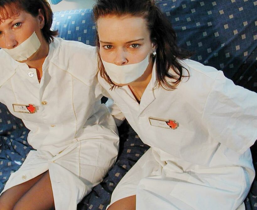 Two cute nurses tied up and gagged 9 of 75 pics.